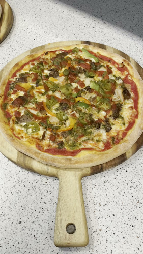 Café Rendezvous Pizza & Steak House - Gastronomi og hotelvirksomhed