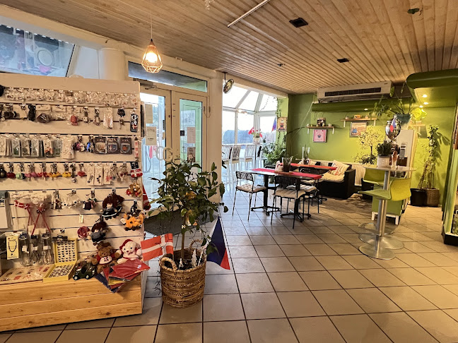 Jazzy’s Cafe’ & Shop ( Cakes,coffee,Asian grocery,Womens Clothing)