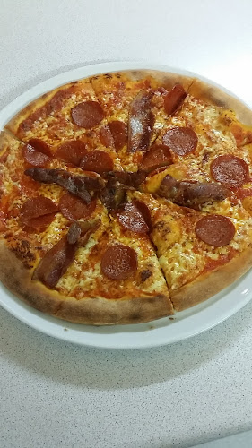 Roma Pizzaria & Grillbar - Gastronomi og hotelvirksomhed