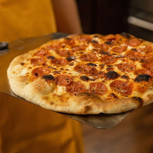 Laguna Pizzeria - Gastronomi og hotelvirksomhed