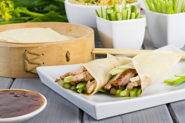 Den fredelige Kinastue - Gastronomi og hotelvirksomhed