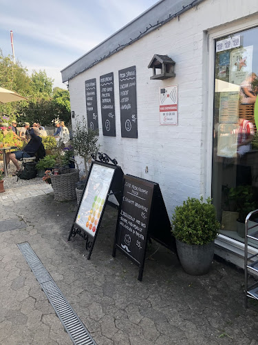 Den Røde Tomat - Gastronomi og hotelvirksomhed