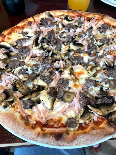 Købmandsgårdens Pizza House - Gastronomi og hotelvirksomhed