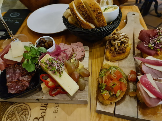 Tappo Restaurant, Winebar & shop - Gastronomi og hotelvirksomhed