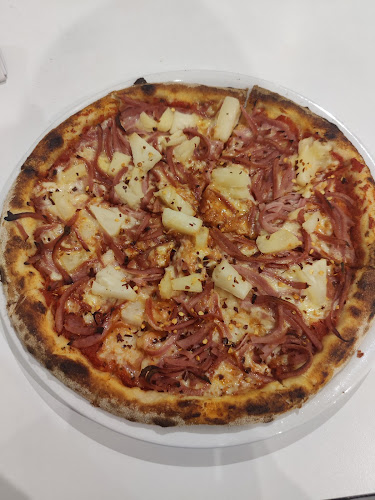 Mulles Pizza - Gastronomi og hotelvirksomhed