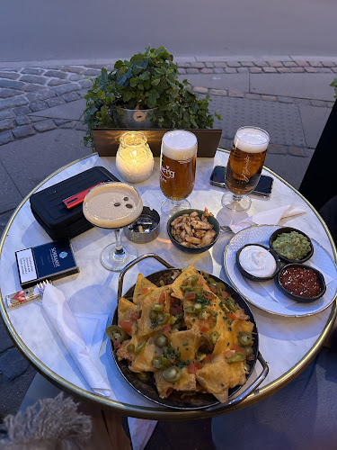 Mojoe Kitchen & Bar - Gastronomi og hotelvirksomhed