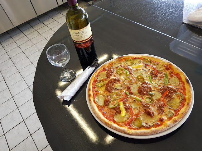 Fortezza Pizza - Gastronomi og hotelvirksomhed