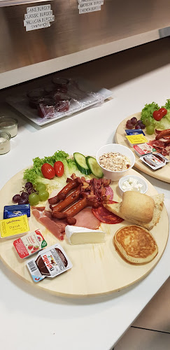 Café Rendezvous Pizza & Steak House - Gastronomi og hotelvirksomhed