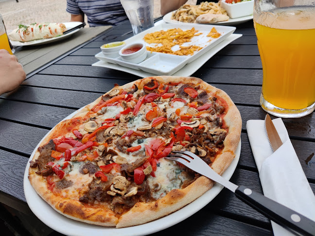 Reina Pizza & Restaurant - Gastronomi og hotelvirksomhed